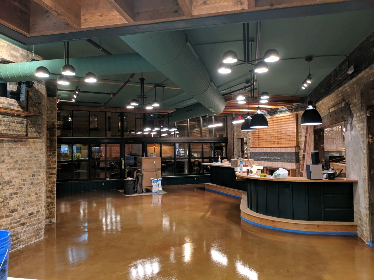 Stained and sealed concrete floor in a restaurant dining room